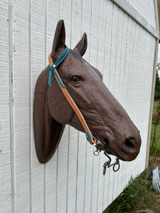 Teal leather tack set one ear and tripping collar.