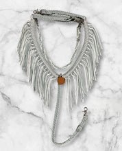 Silver and white fringe breast collar with wither strap and matching round reins