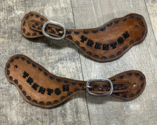 Hand tooled and painted spur straps