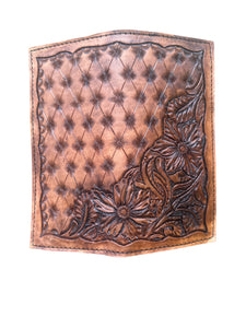 Hand tooled tally book.