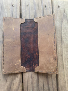 Hand tooled tally book.