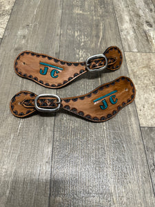 Custom Brand Hand tooled and painted  spur straps.