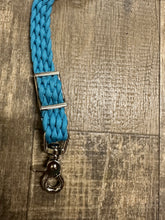 Fancy wither strap in neon turquoise with rhinestones