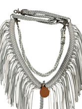 Silver and white fringe breast collar with wither strap and matching round reins