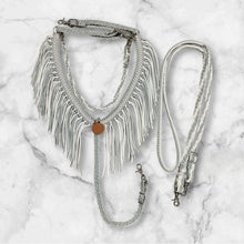 Silver and white fringe breast collar with wither strap and matching round reins