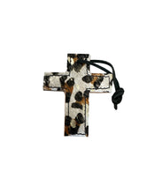 leather saddle cross