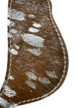 Silver and brown hair on spur straps