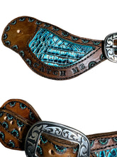 Hand tooled and painted spur straps with your custom wording stamped