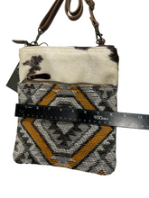 myra yellow and black cowhide canvas cross body  bag with tooled leather